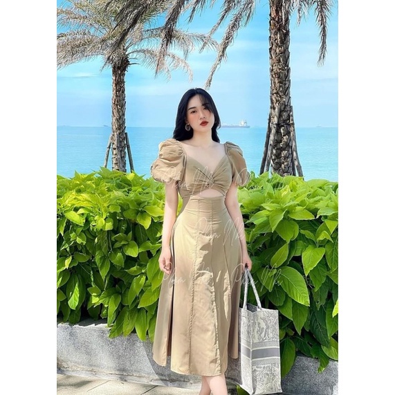 Váy xoắn ngực cut out li dọc tay bồng hot hit