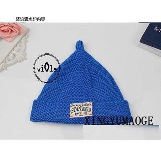 Mũ len chóp nhọn gắn tag