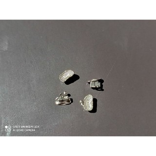 Mắc cài răng 6,răng 7 chỉnh nha