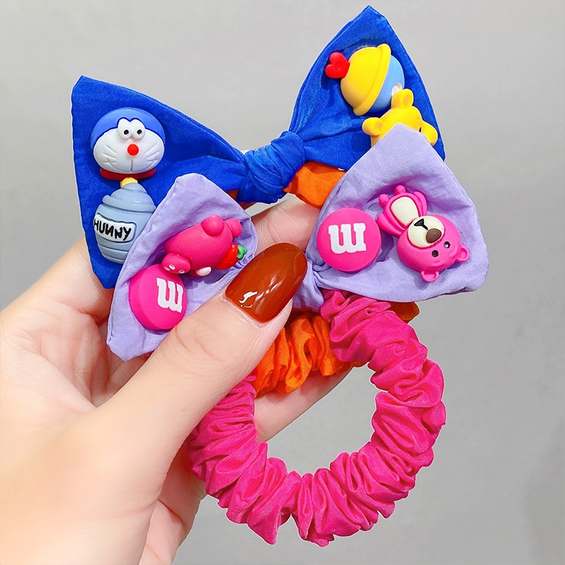 Dây Cột Tóc Cao Su Họa Tiết Hoạt Hình Doraemon Winnie Lotso CMX2 Cho Bé Gái