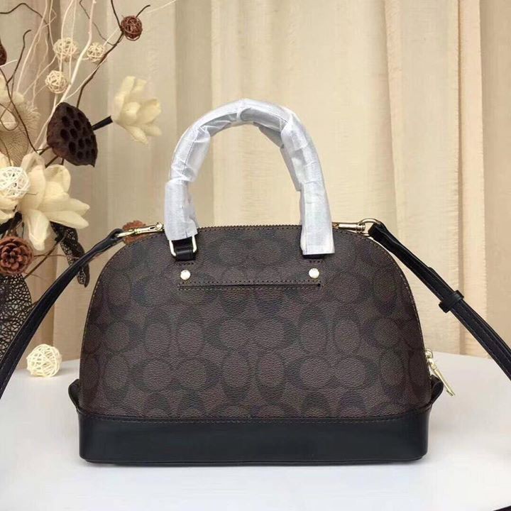 Túi xách Coach hến nâu đen đậm