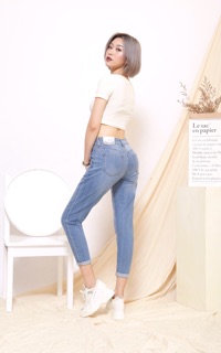 Quần bò cúc lệch