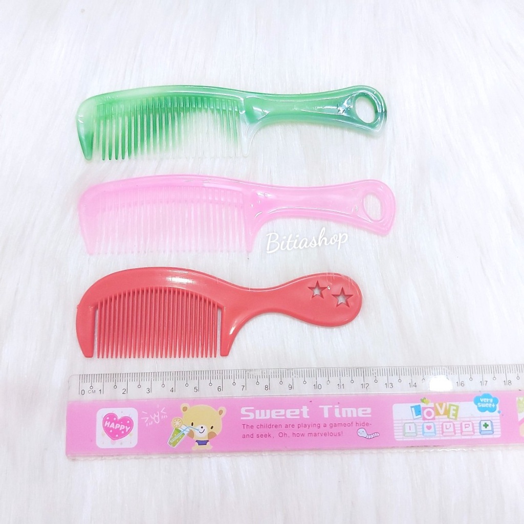 1 CÂY LƯỢC NHỰA MINI MÀU TRƠN BỎ TÚI