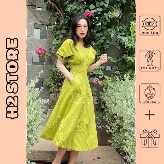 Váy cốm xanh cổ V li eo túi trước tay chun