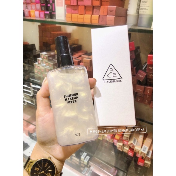 Xịt khoá căng bóng có nhũ Makeup 3CE 𝐒𝐡𝐢𝐦𝐦𝐞𝐫 𝐌𝐚𝐤𝐞𝐮𝐩 𝐅𝐢𝐱𝐞𝐫 𝟏𝟎𝟎𝐦𝐥(chai màu trắng)