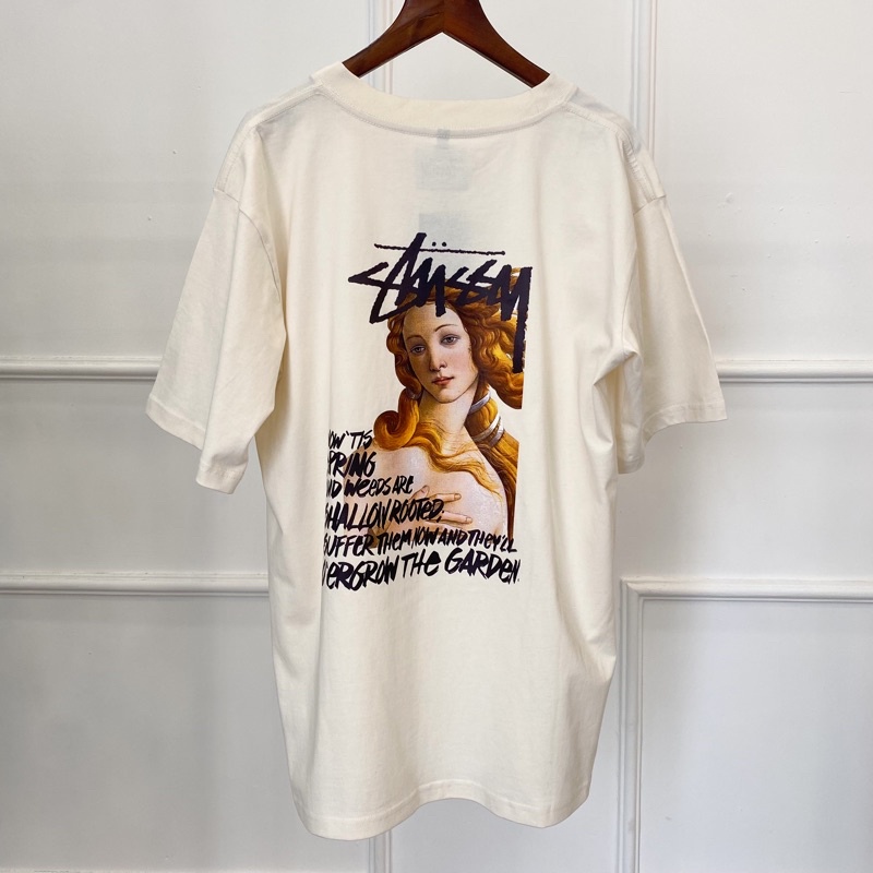 Áo Thun Stussy Bape Màu Kem Tay Lở Hoạ Tiết Cô Gái