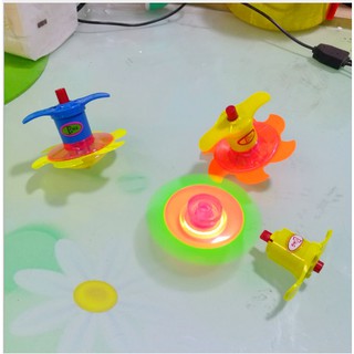 Con quay bằng nhựa nút bấm phát sáng