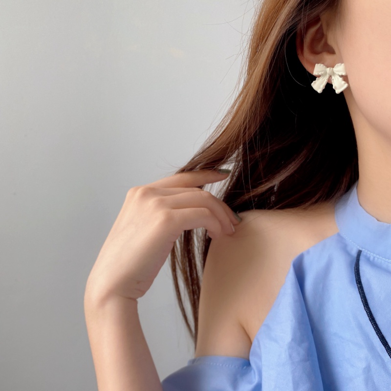 We Flower Hoa tai hình nơ màu trắng thời trang Hàn thanh lịch cho nữ