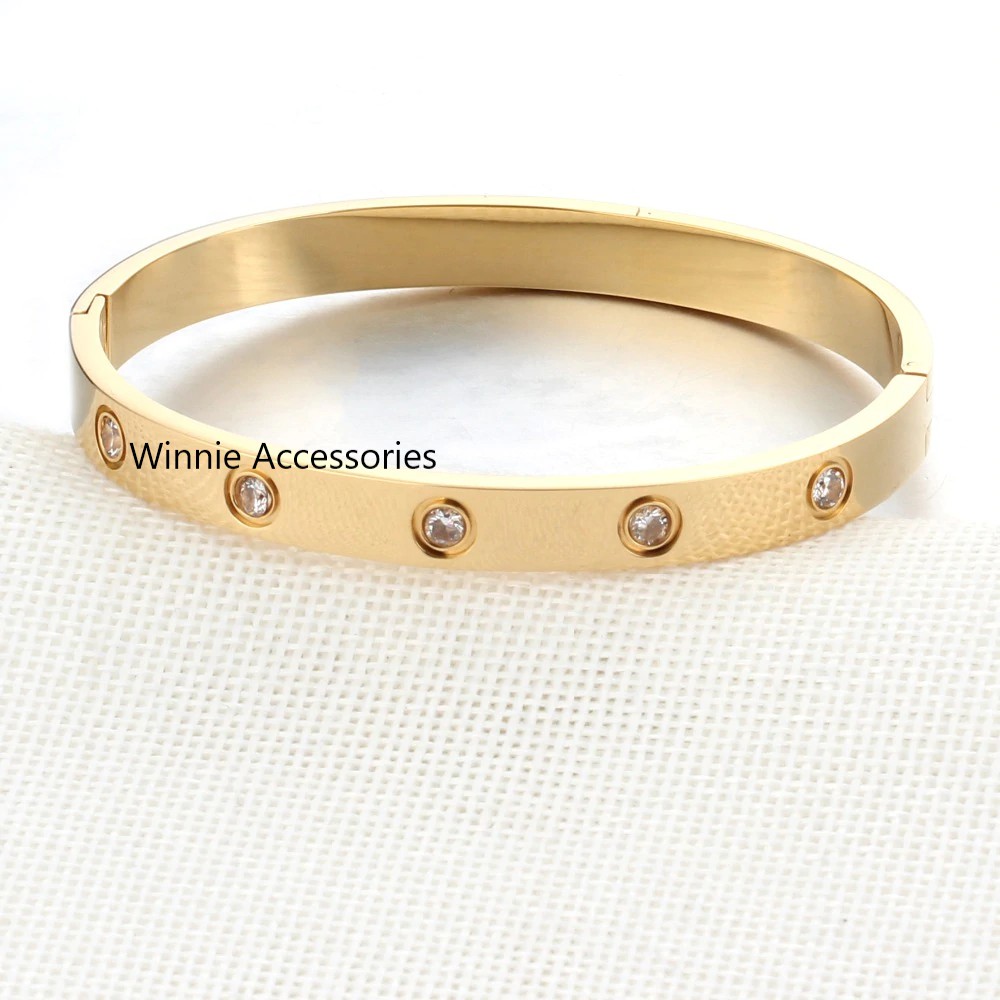 Vòng tay nữ titan love vàng gold