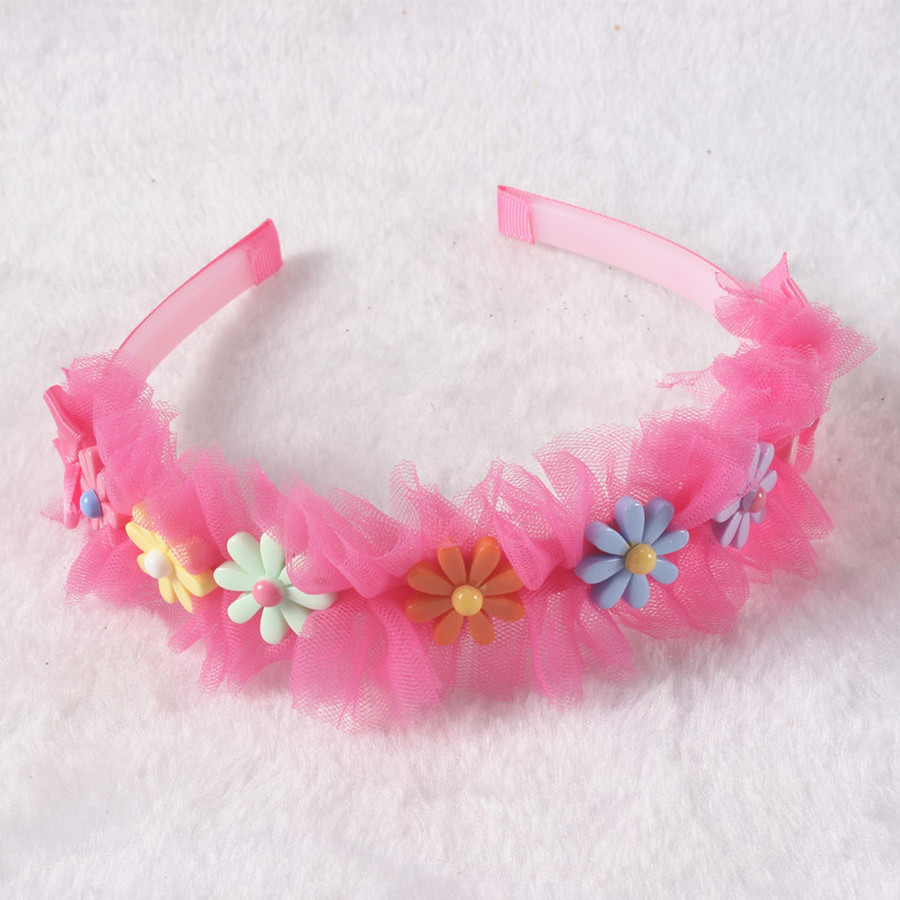 Cài tóc đính hoa xinh xắn cho bé gái