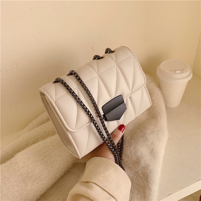 Túi xách đeo chéo khóa sập gương