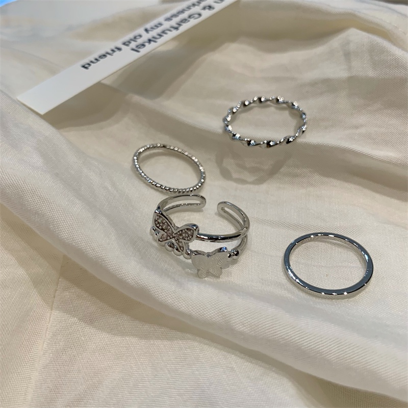 Bộ Bốn Nhẫn Hình Bướm Kết Hợp Đèn Thời Trang Cá Tính Sang Trọng Cho Nữ