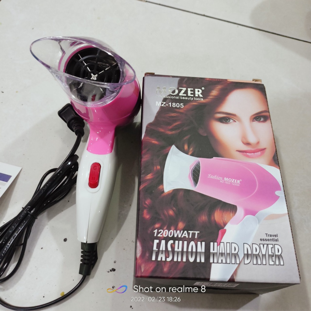 máy sấy mini mz 1805 công suất cưc mạnh 1200 wat . có khí nóng mát nhỏ gịn cho sử dụng cá nhân và mang đi du lịch