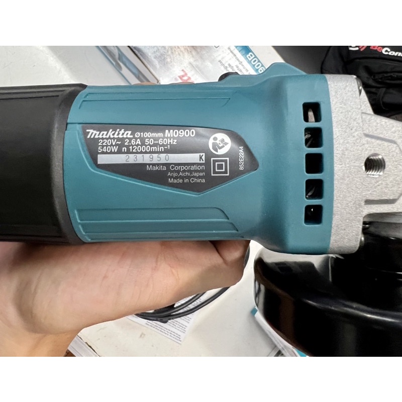 Máy mài góc cầm tay bằng điện Makita M0900B