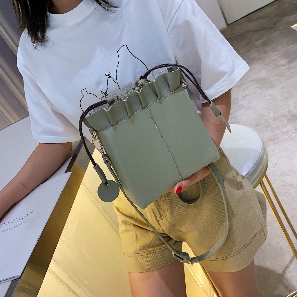 Túi đeo chéo miệng dây rút 2 dây màu trơn _T1116