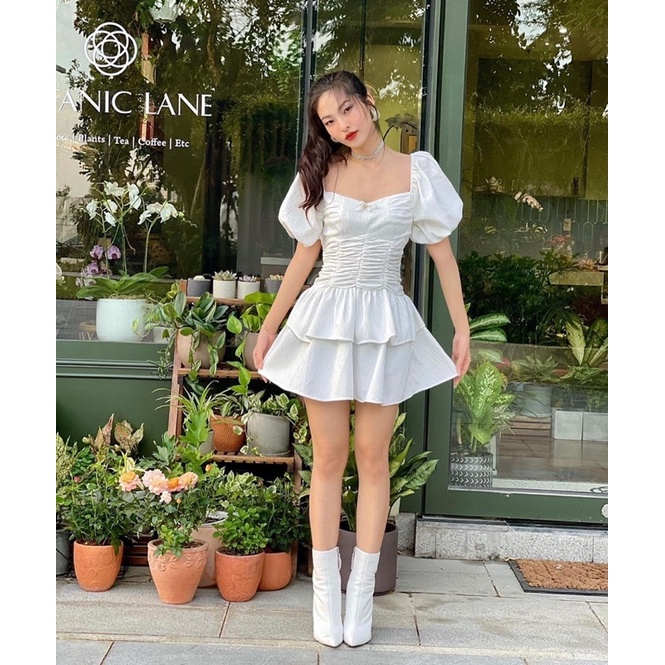 Đầm trắng nơ 2 tầng l