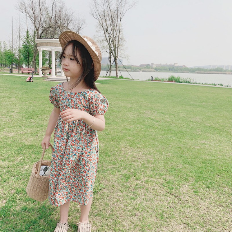 Đầm hoa thiết kế hở lưng xinh xắn cho bé gái