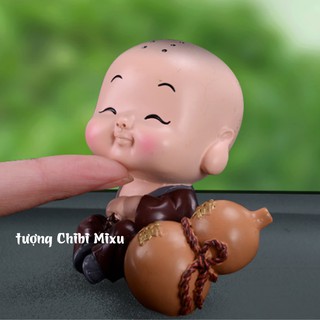 Tượng chibi chú tiểu hạnh phúc