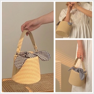 Bowknot lattice bucket bag straw woven bag women 2021 new fashion wild shoulder messenger western style straw woven handbag