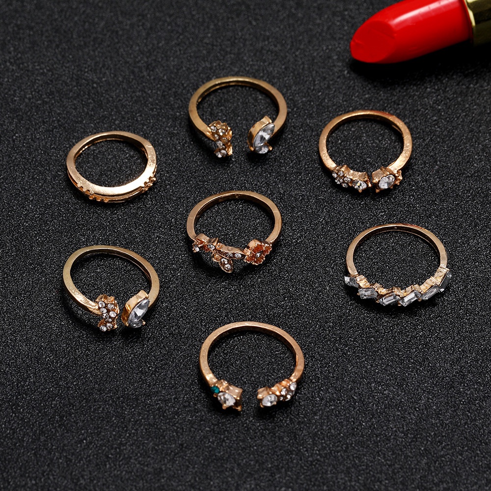 Bộ 7 cái nhẫn dạng mở chỉnh được gắn pha lê hình hoa và bướm cổ điển đáng yêu cho nữ