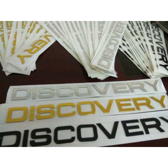 Chữ Discovery kim loại dán xe