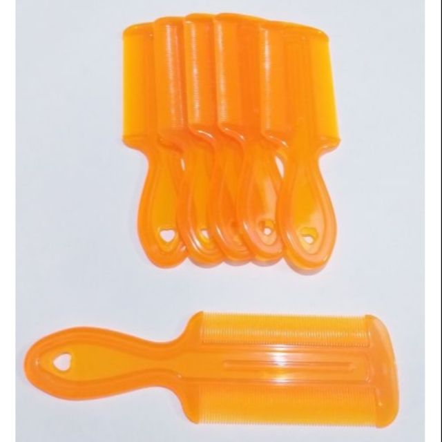 Sỉ 6 lược chải chí,chải gàu nhựa cứng (màu cam)