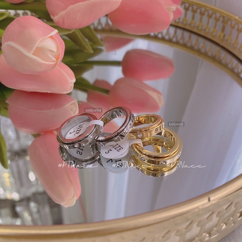 Nhẫn titan thương hiệu cá tính, mặt xoay đính đá .PTNACC.