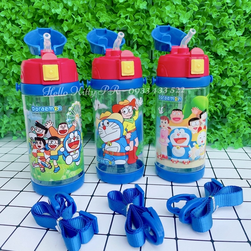 Bình nước 550ml có dây đeo Hello Kitty - Doremon Doraemon