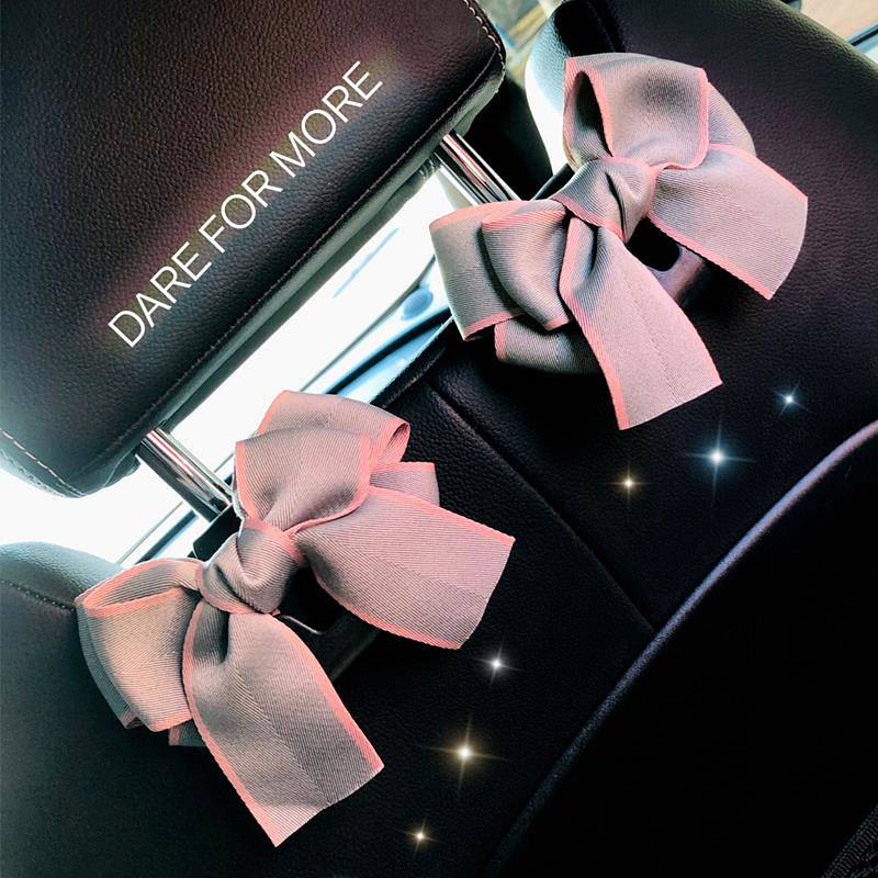 Móc treo đồ đa năng gắn sau ghế ngồi xe hơi kiểu nơ dễ thương