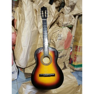 Đàn guitar phổ thông mặt pha đẹp