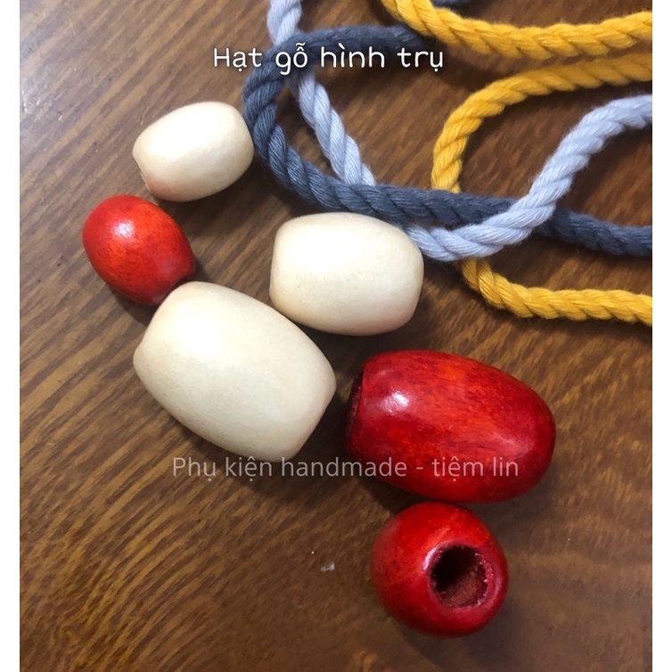 Túi 10 hạt gỗ hình trụ màu đỏ, trắng lỗ to làm handmade
