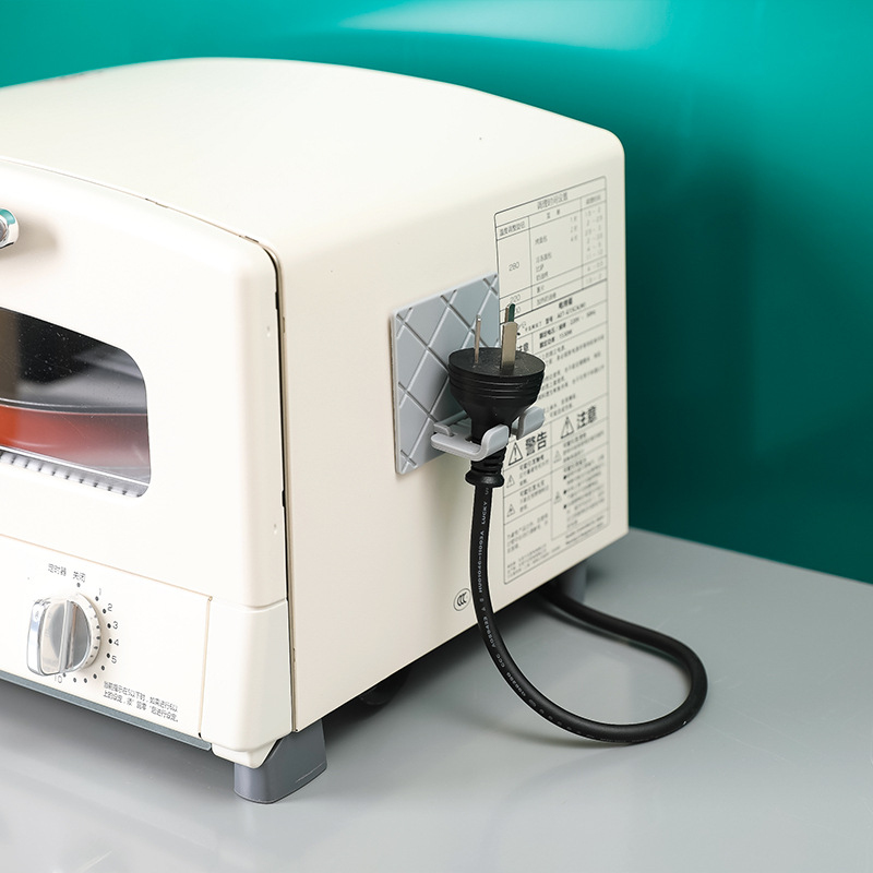 Móc dán tường treo phích cắm điện chống ẩm tiện dụng