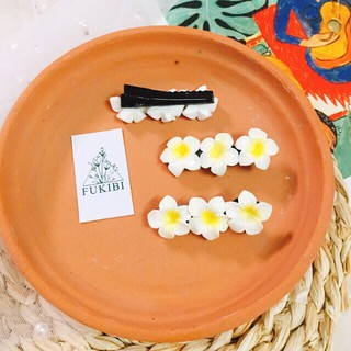 KẸP TÓC, CỘT TÓC HOA SỨ ẢNH THẬT