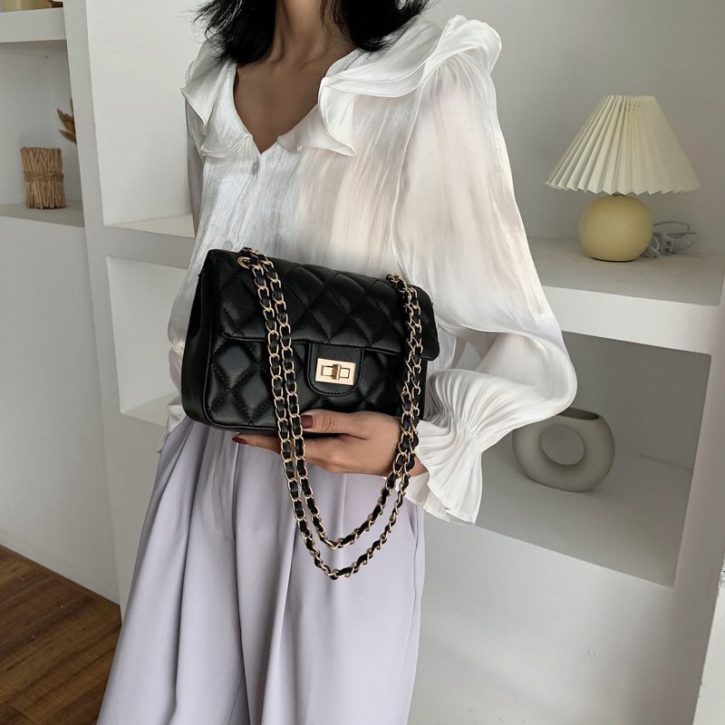 Túi da nữ trần trám khóa ngang - MA199