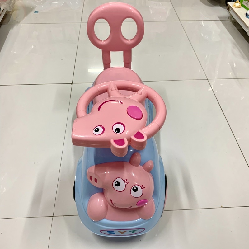 XE LẮC CHÒI CHÂN HEO CÓ NHẠC +CÒI CHO BÉ