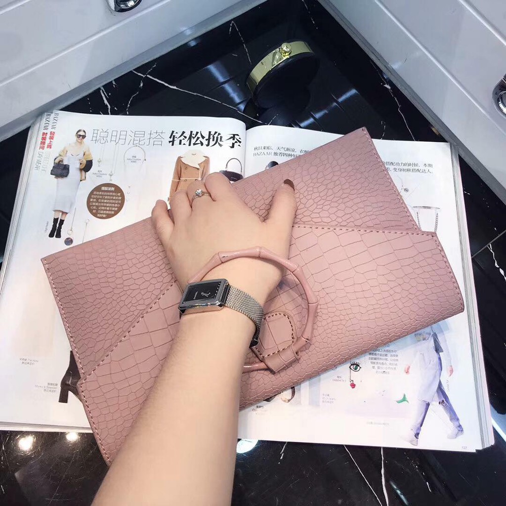 [Về lại]CLUTCH DỰ TIỆC CẦM TAY KHOEN TRÒN