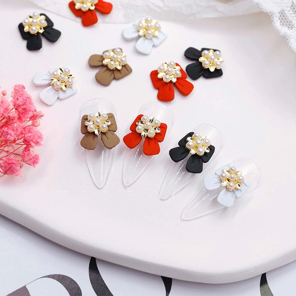 [Hàng mới về] Phụ kiện trang trí móng tay hình nơ/hoa tuyết 3D từ hợp kim đính ngọc trai lấp lánh sang trọng cho nữ DIY