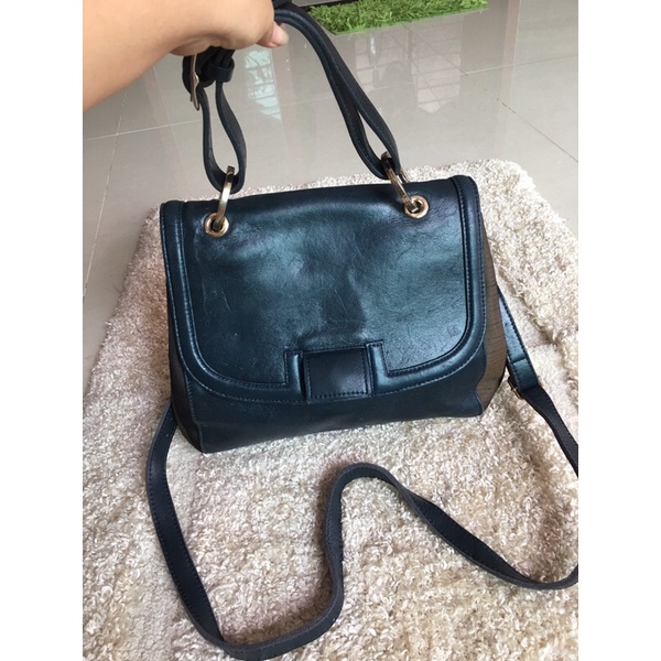 Túi si da thật y hình phom công sở