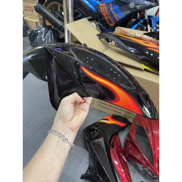 Áo Ex nhỏ đỏ đen tem lửa dán sẵn