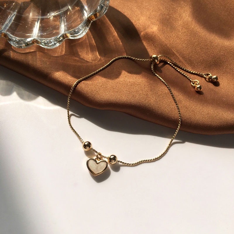 Lắc Tay Khoá Rút Trái Tim Đá Trắng - Vani Store [TS000588]