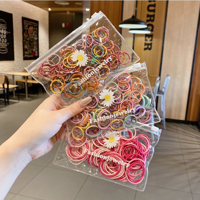 Set 100 chun cột tóc, dây buộc co giãn nhiều màu cho bé