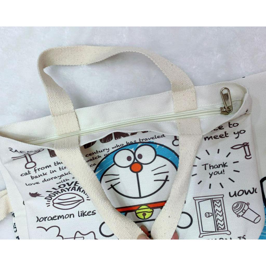 Túi xách đeo vai bằng vải canvas in họa tiết Doraemon đáng yêu cho nữ