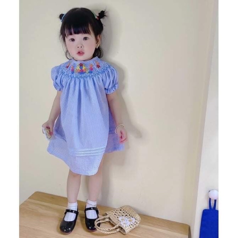 ĐẦM SMOCK HOA NHÍ SỌC XANH