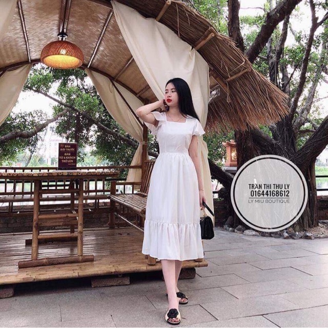 Đầm trắng đuôi cá