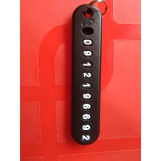 Móc treo chìa khoá có gắn số điện thoại