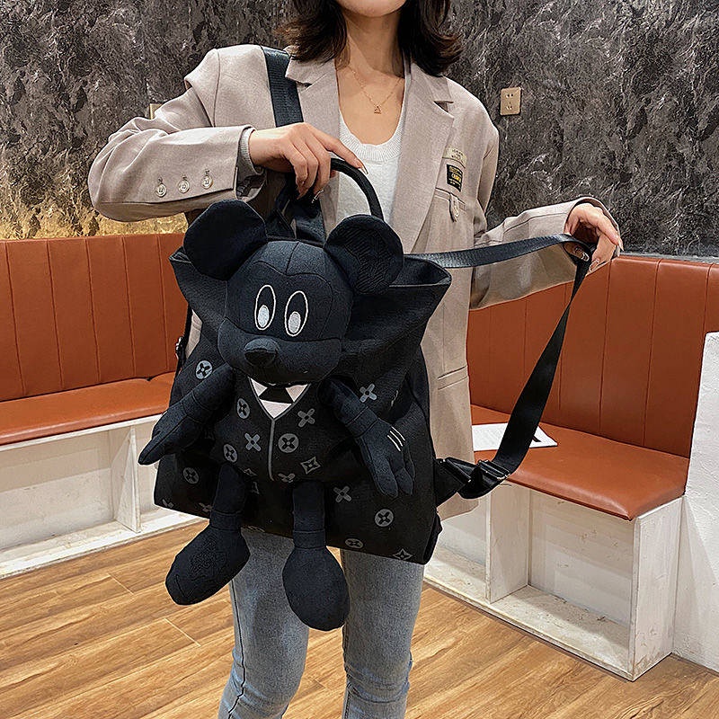 Ba lô đi học vải canvas cỡ lớn đính búp bê Mickey thời trang cho nữ 2021