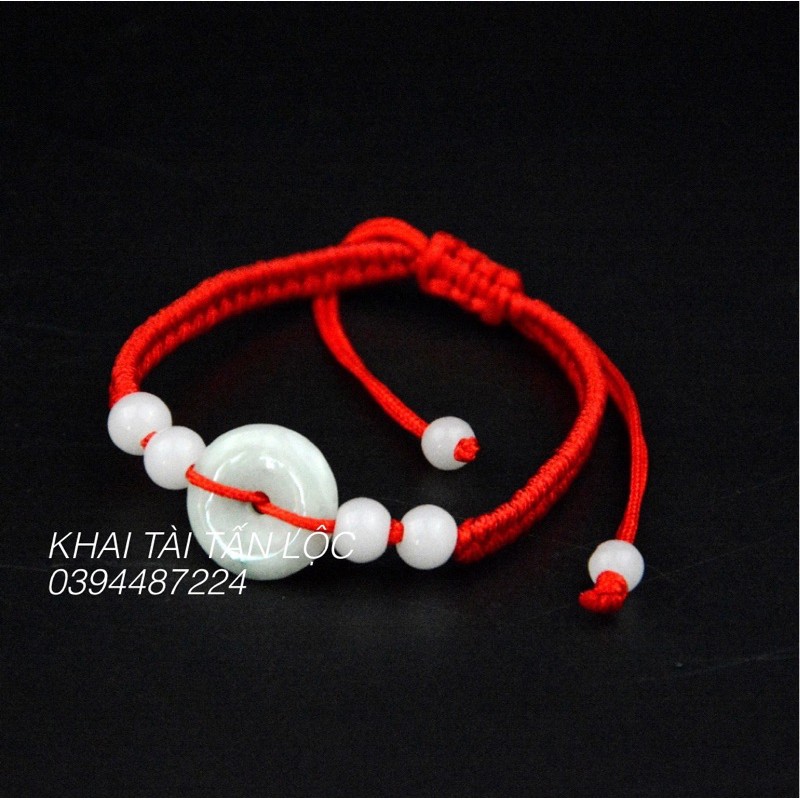 Vòng tay đồng điếu dây đỏ bằng đá chiêu tài
