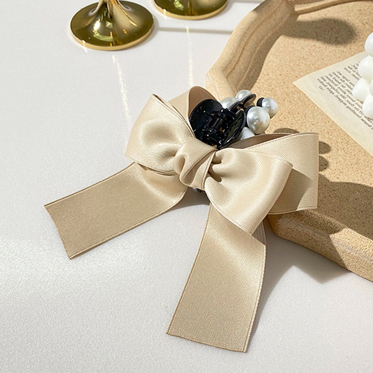 Kẹp tóc hình nơ đính ngọc trai nhân tạo thời trang