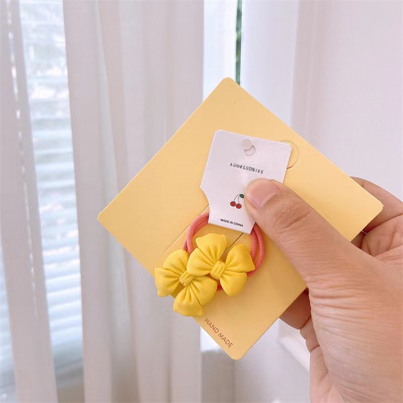 Dây Cột Tóc Co Giãn Đính Nơ Màu Kẹo Dễ Thương Cho Bé Gái