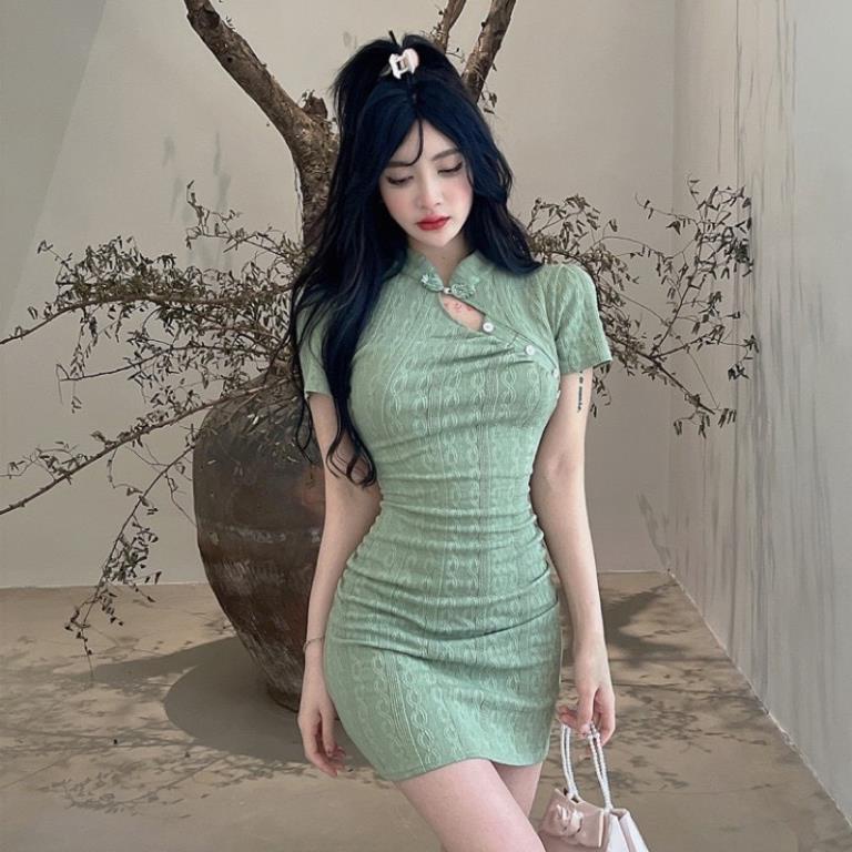 Đầm body len tăm cổ tàu xanh min cột nơ lưng trắng